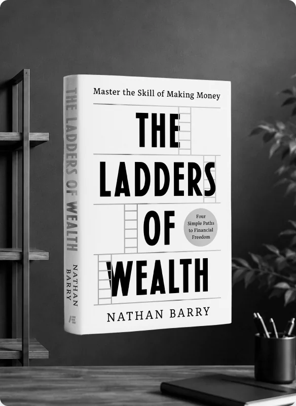 The Ladders of Wealth book by Nathan Barry standing on a desk